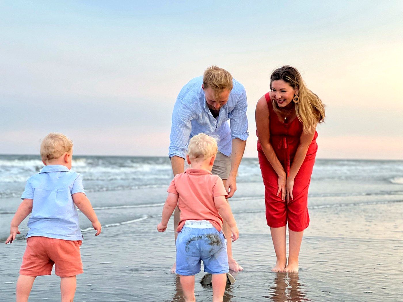 Katelyn and John Shelton with two of their children at the beach