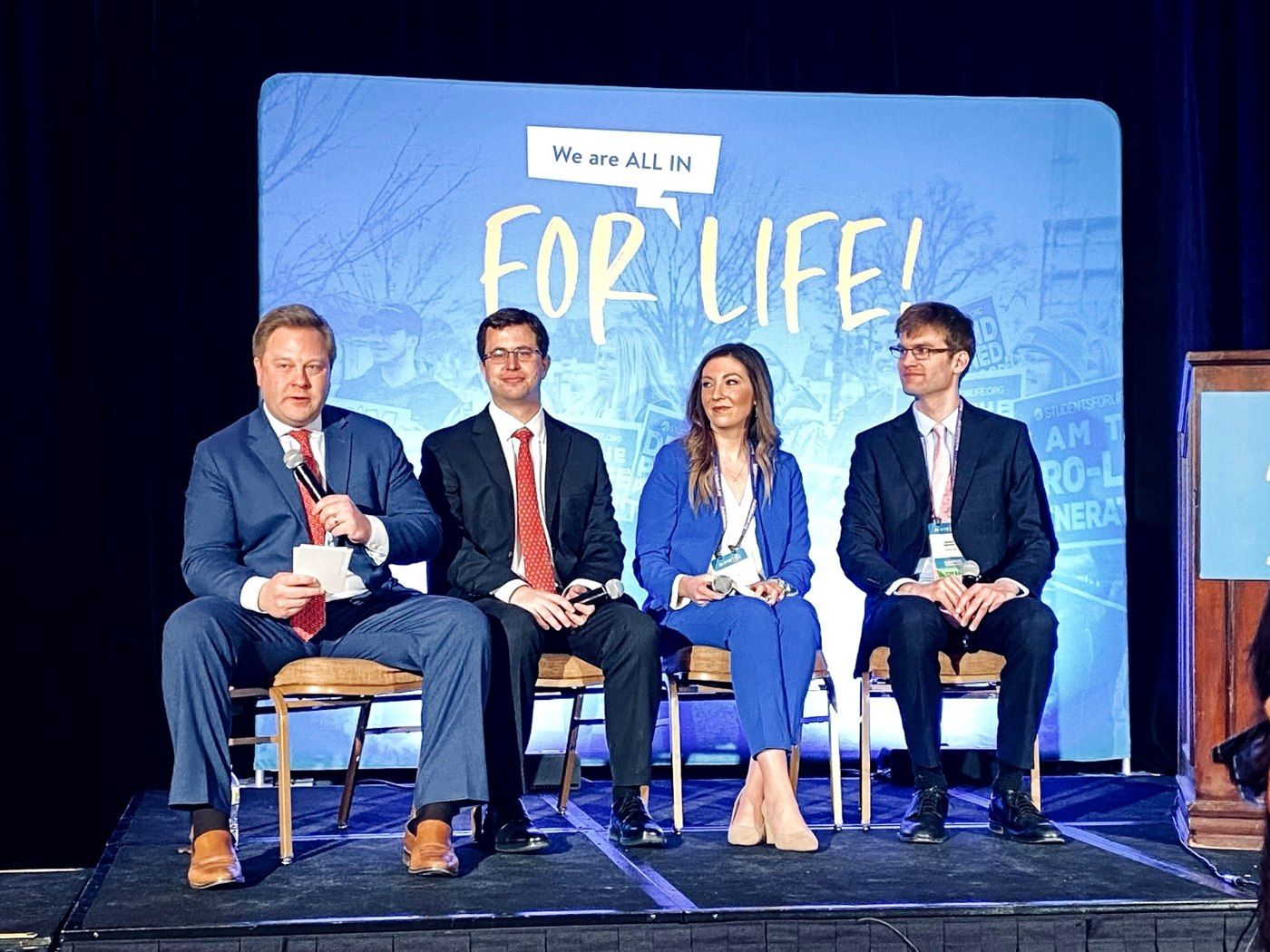 Katelyn Walls Shelton seated on a panel at a Students for Life event